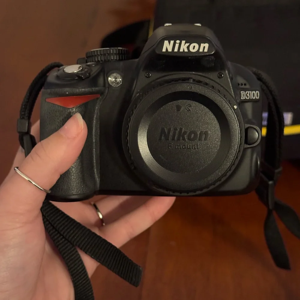 Nikon D3100 with 18-55mm lens + 55-200mm lens